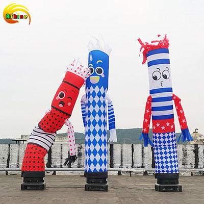 Cartoon inflatable dancers with a quirky temperament wave and dance to people